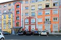 Maisons de villes peintes en trompe l’oeil sur les immeubles (Résidence "La Sarra"), rue Pauline Jaricot Lyon 5ème